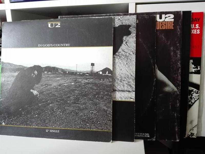 Selection of U2 Maxi Singles, including rare vinyls.