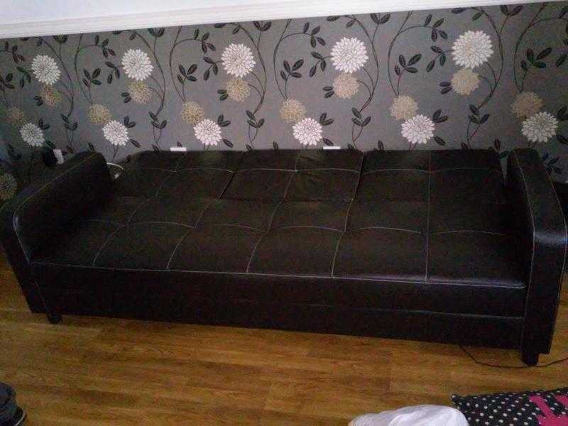 Selling sofa bed,great condition,almost new.leather black