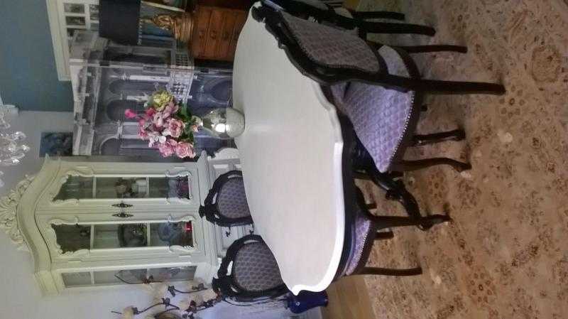 Shabby chic dining table and 4 chairs .