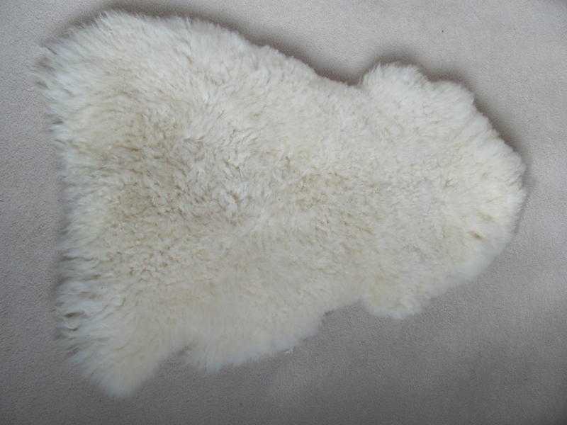 sheepskin rugs,  natural cream colour