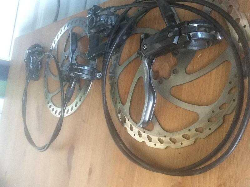 Shimano deore fluid brakes good condition new pads 5-10 miles ago