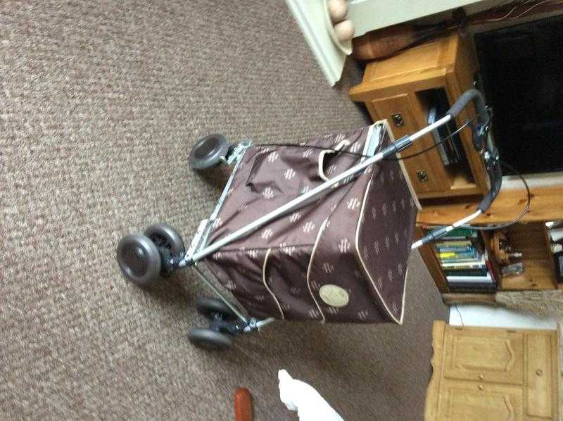 Sholley shopping trolley .as new .hand brake .