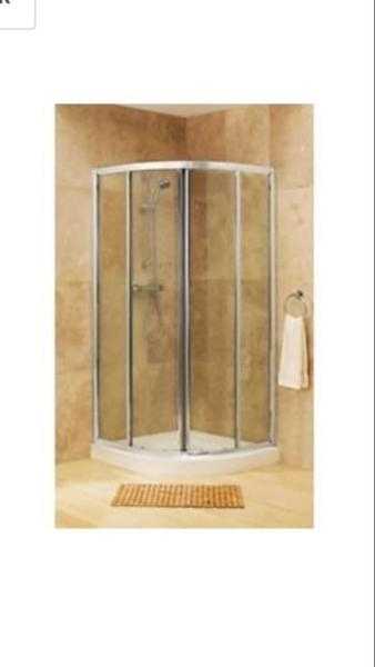 Shower enclosure with tray
