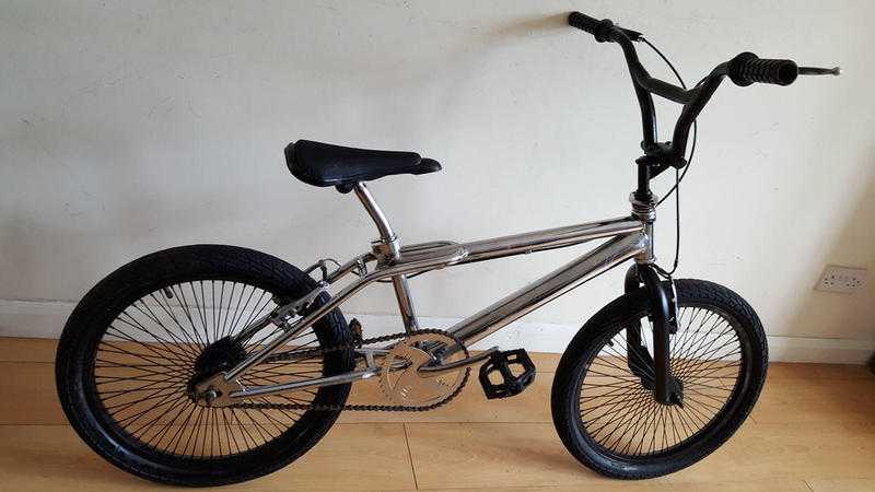 Silver BMX Bike - 20 inch wheels. (Suit age 8 to 16 years).