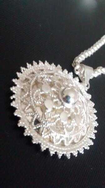 Silver filigree pattern pendant, ring and ear-rings set- excellent condition.