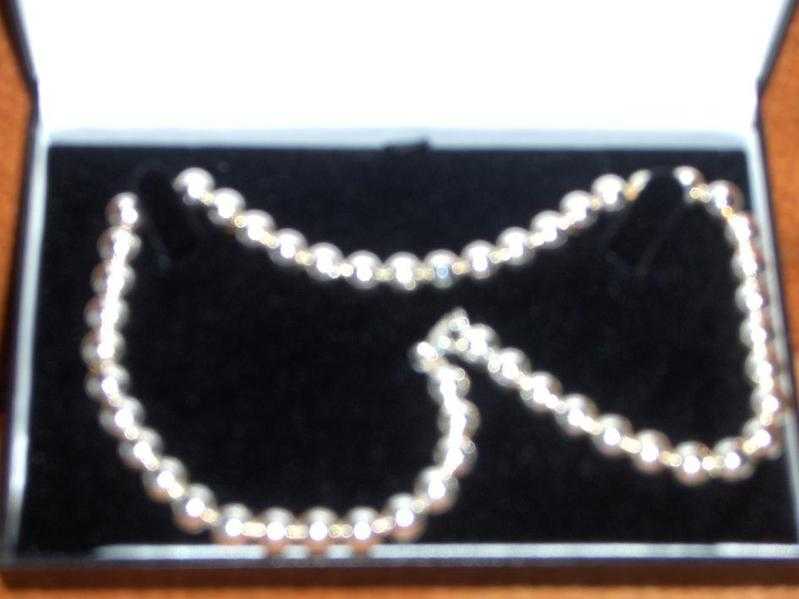 Silver necklace and bracelet set brand new