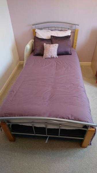 Single bed including mattress and pull out bed