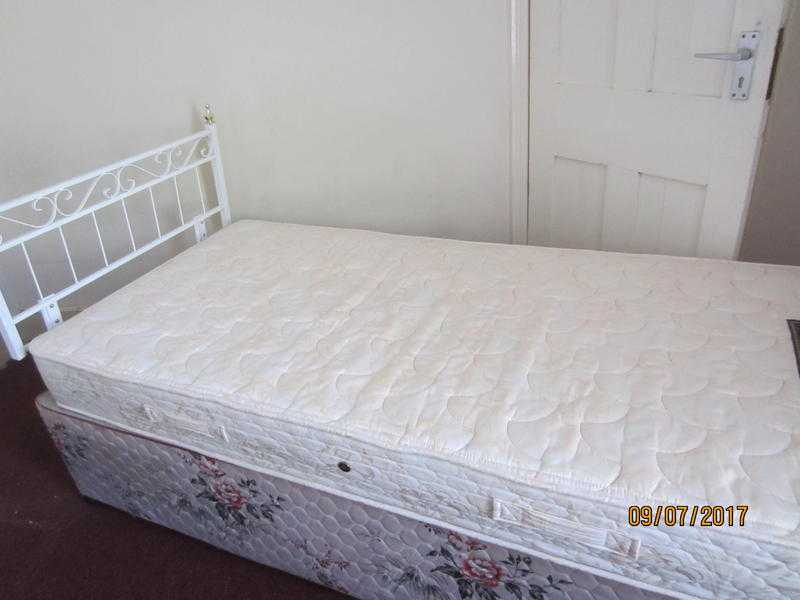 single bed with headboard