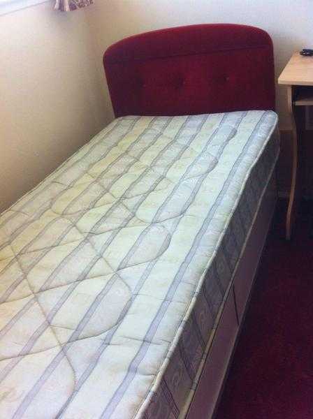 Single bed with mattress and headboard