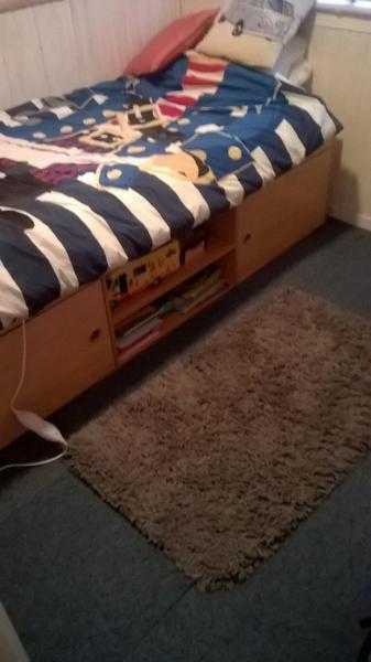 single cabin bed beech colour good condition with built in shelves and storage with mattress