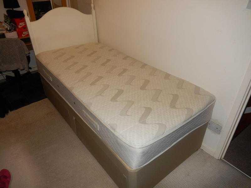 Single Divan Bed including mattress and headboard.