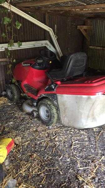 Sit on lawn mower Honda , sale due to move