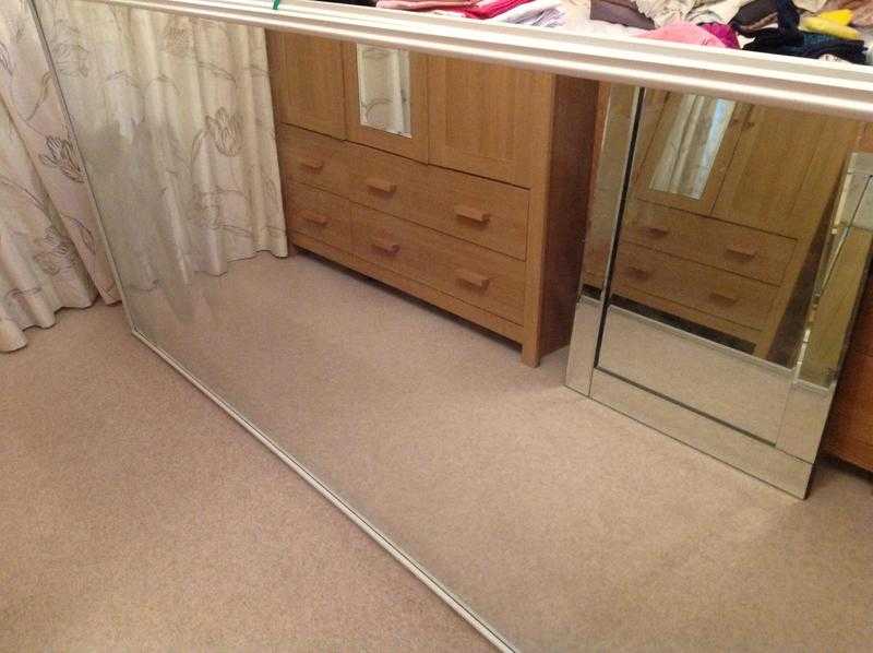 Sliding mirrored wardrobe doors