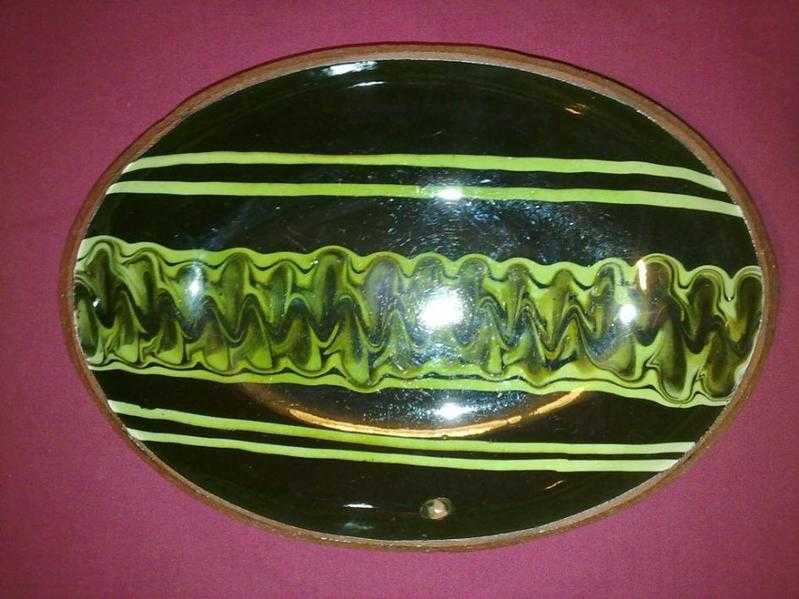 Slipware dish, pressed clay