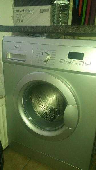 Sllver washing machine almost new