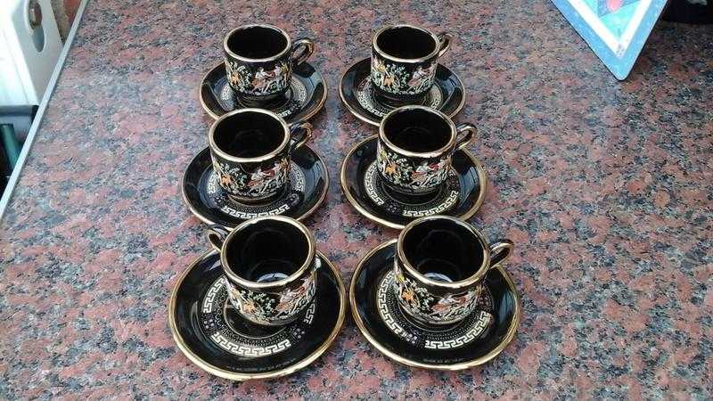 Small coffee cups and saucers