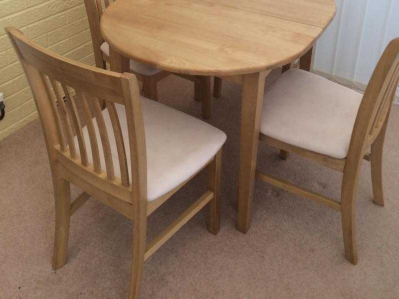 Small dining table and 4 chairs