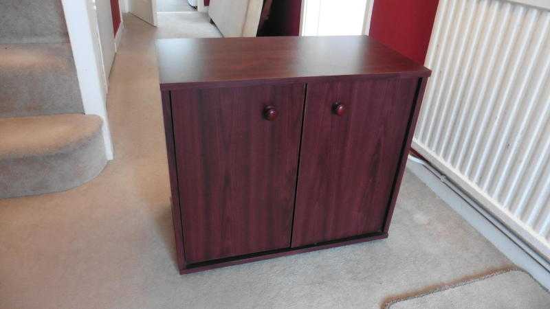 Small Mahogany coloured cupboard