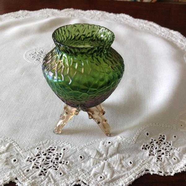 Small Victorian green coloured, three legged glass vase. Slight roughness on 2 legs.
