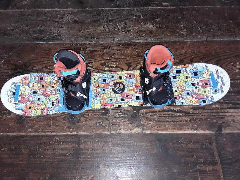 Snowboard package for kids by Burton. Foot size 2 to 4