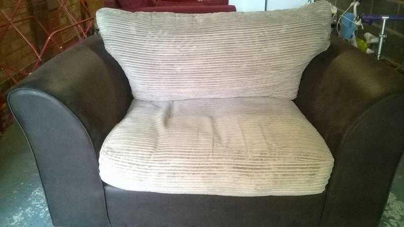 Snuggler sofa. Brown suede with beige cushions.