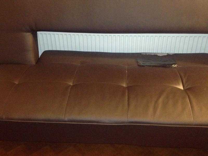 sofa bed - black  double, (slight damage)     Calls only