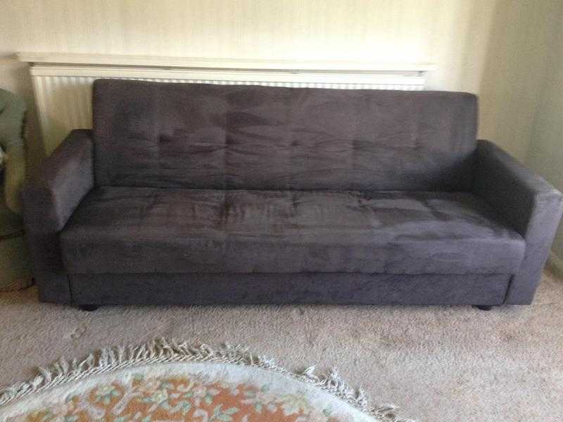 Sofa bed with storage under.. Chocolate brown suede . 50 ono