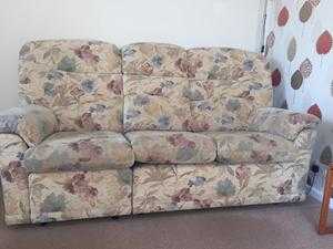 Sofa green leather 3,seater and single chair with recliner good condition