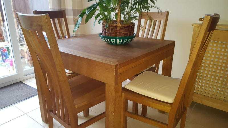 Solid extendable kitchen table and chairs