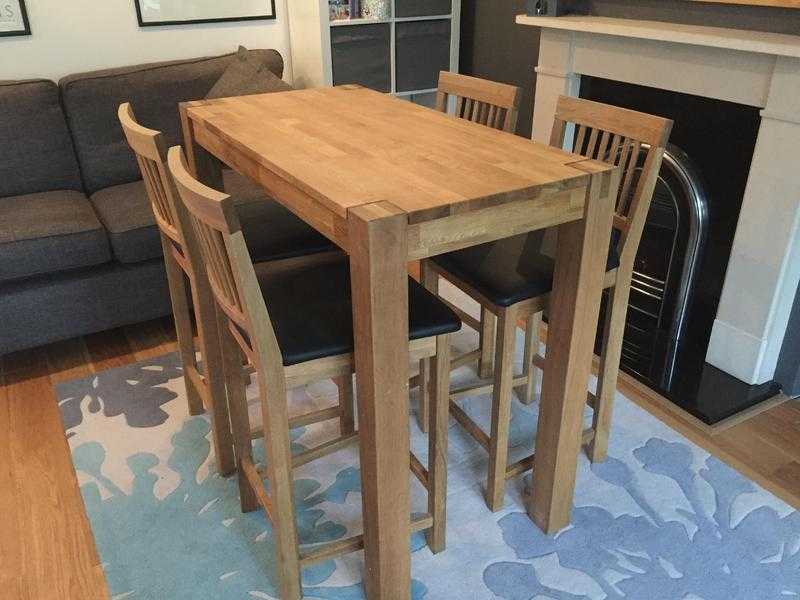 Solid Oak Breakfast table and 4 leather chairs