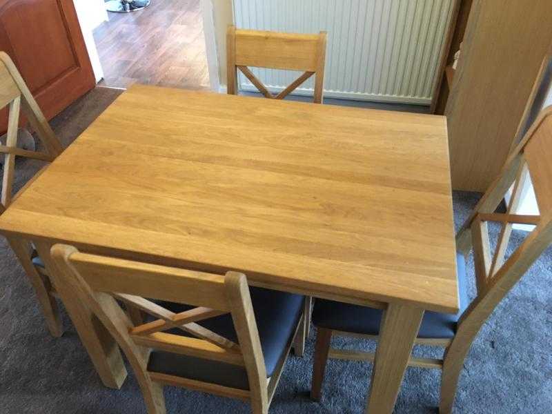 Solid Oak Dining room table amp 4 chairs