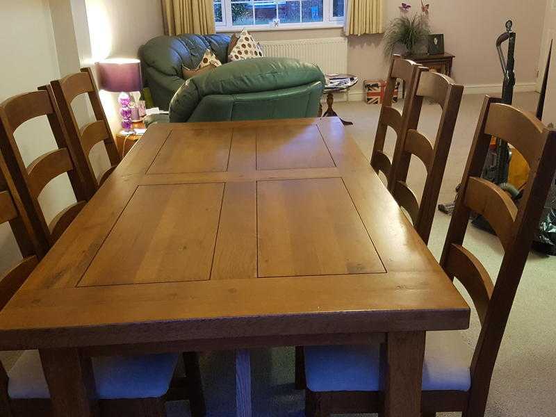 Solid Oak Extending table and 8 chairs, display cabinet and occasional table