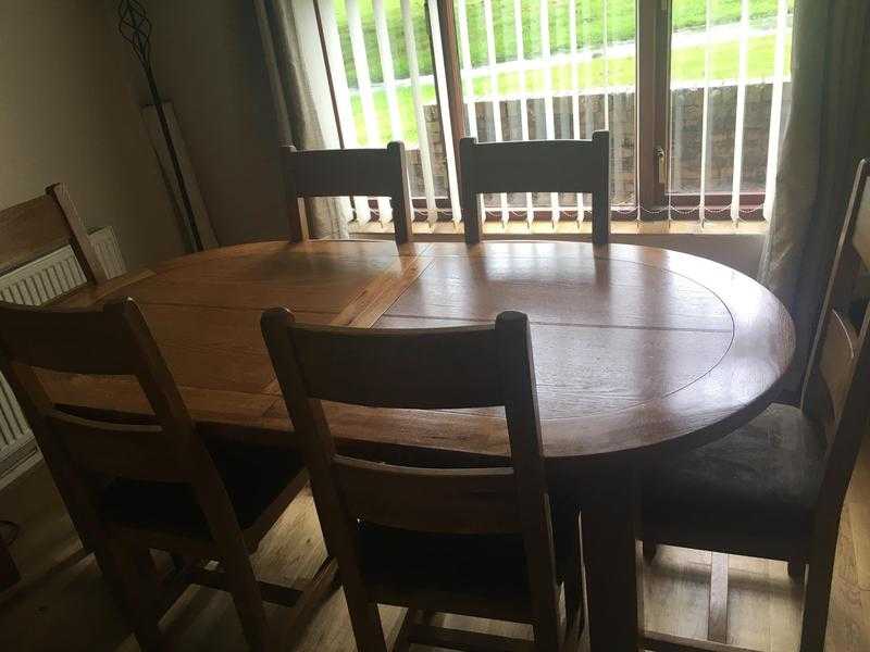 Solid oak table and chairs