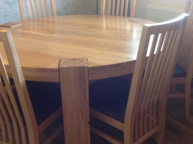 Solid oak table and chairs