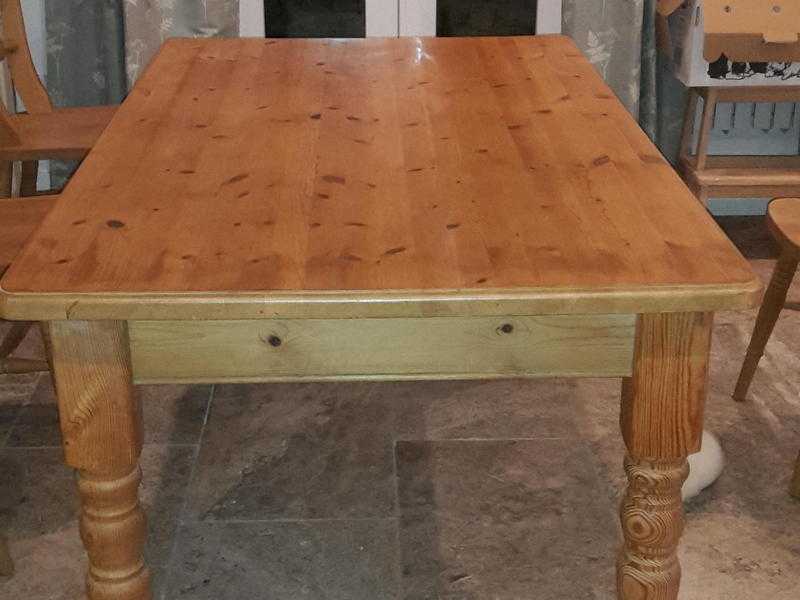 Solid pine farmhouse kitchen table. Seats 6.