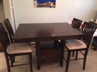Solid wood counter height dining table amp 4 chairs. Great for family gatherings or pubrestaurant