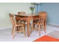 Solid wood dining room table and six chairs