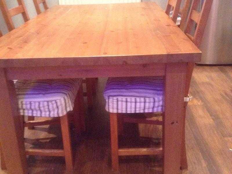 Solid wood dining table and 6 chairs