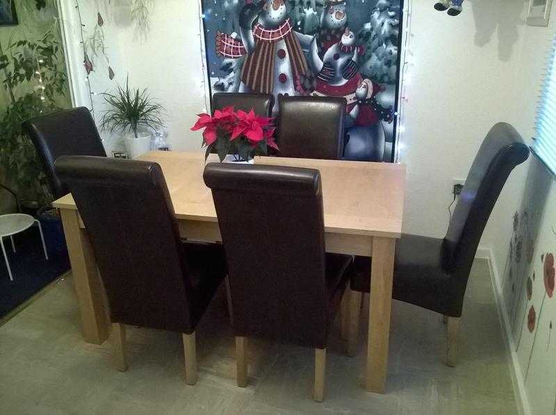 Solid Wood Dining Table With 6 Scrolled Back Brown Leather Chairs