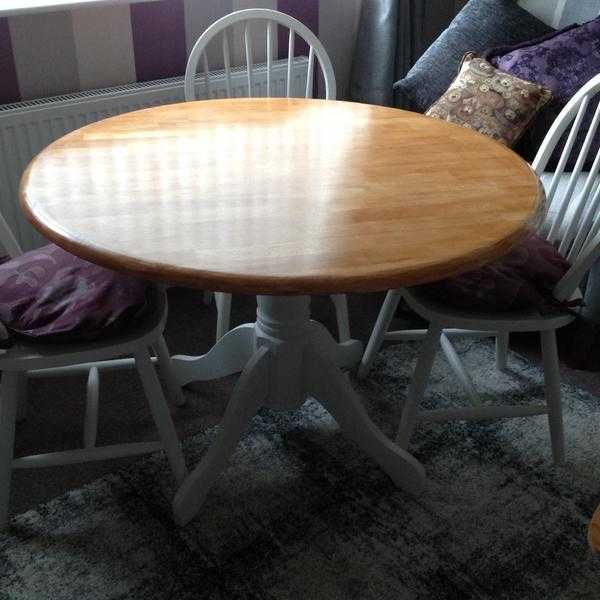 Solid wood table and four chairs