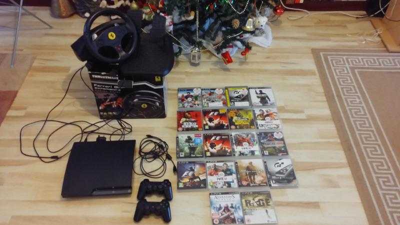 Sony PS3 Slim 250gb  2 controllers- 18 games  Ferrari GT Experience Steering Wheel.