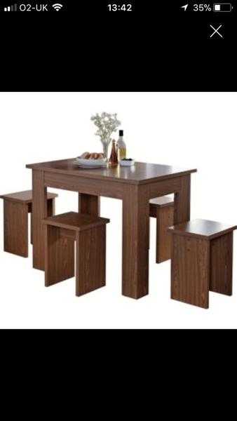 Space saving dining table and stalls