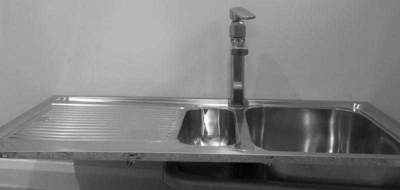 STAINLESS STEEL SINK AND PILLAR TAP