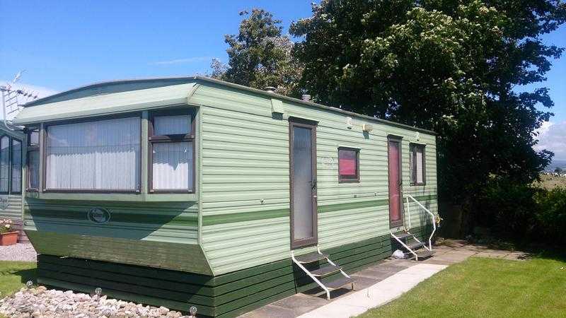 STATIC CARAVAN ON QUIET OWNERS ONLY PARK WITH 12MTH SEASON. PRIVATE SALE