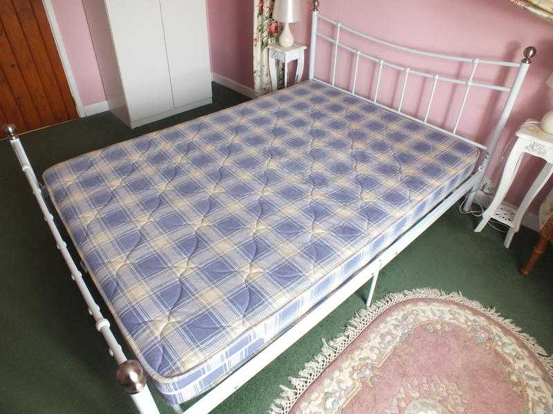 STEEL FRAMED DOUBLE BED WITH SPRUNG MATTRESS