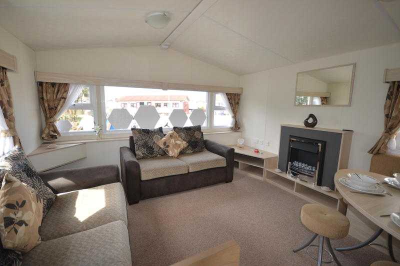 STUNNING 2 BED CARAVAN BY THE SEA