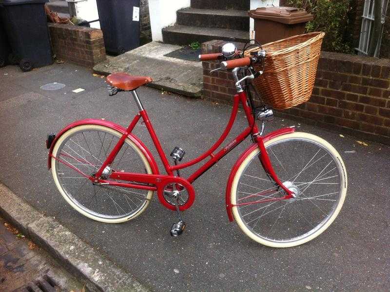 Stylish red ladies039 Britannia Pashley Bicycle with wicker basket