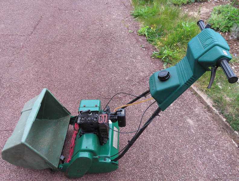 Suffolk Punch Lawn Mower 35s petrol with grass box.