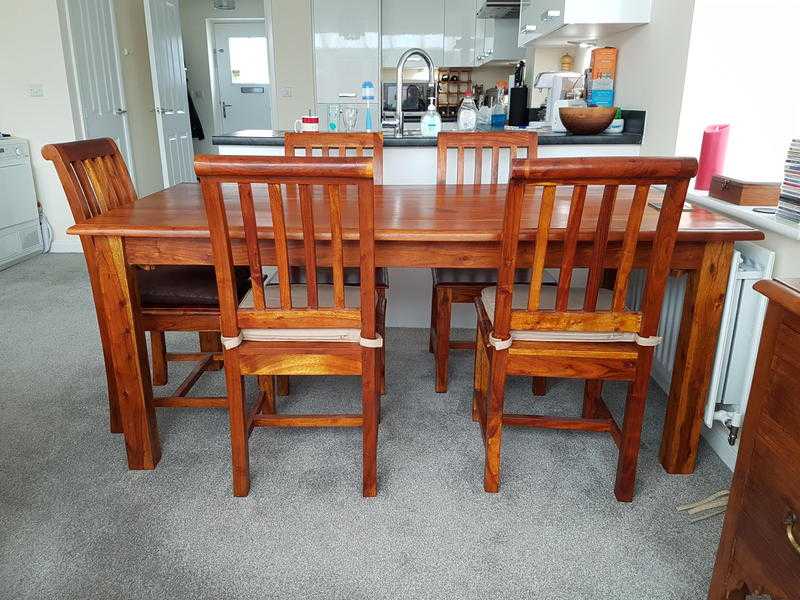 Superb hardwood (Mango) dining table and 6 chairs