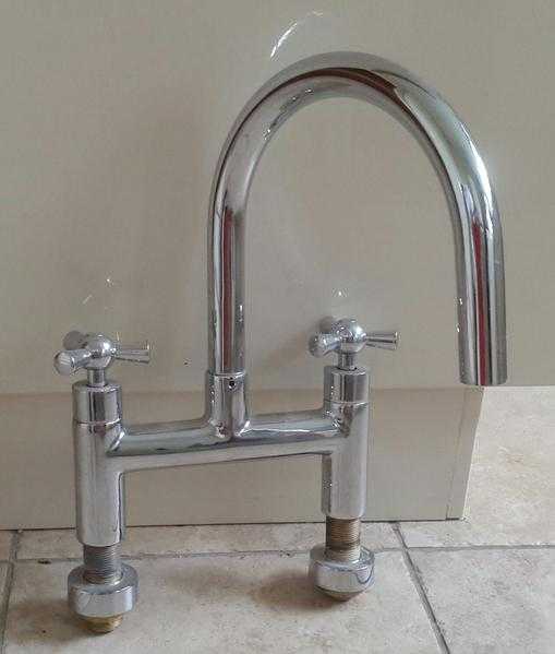 Swan neck bath mixer tap.